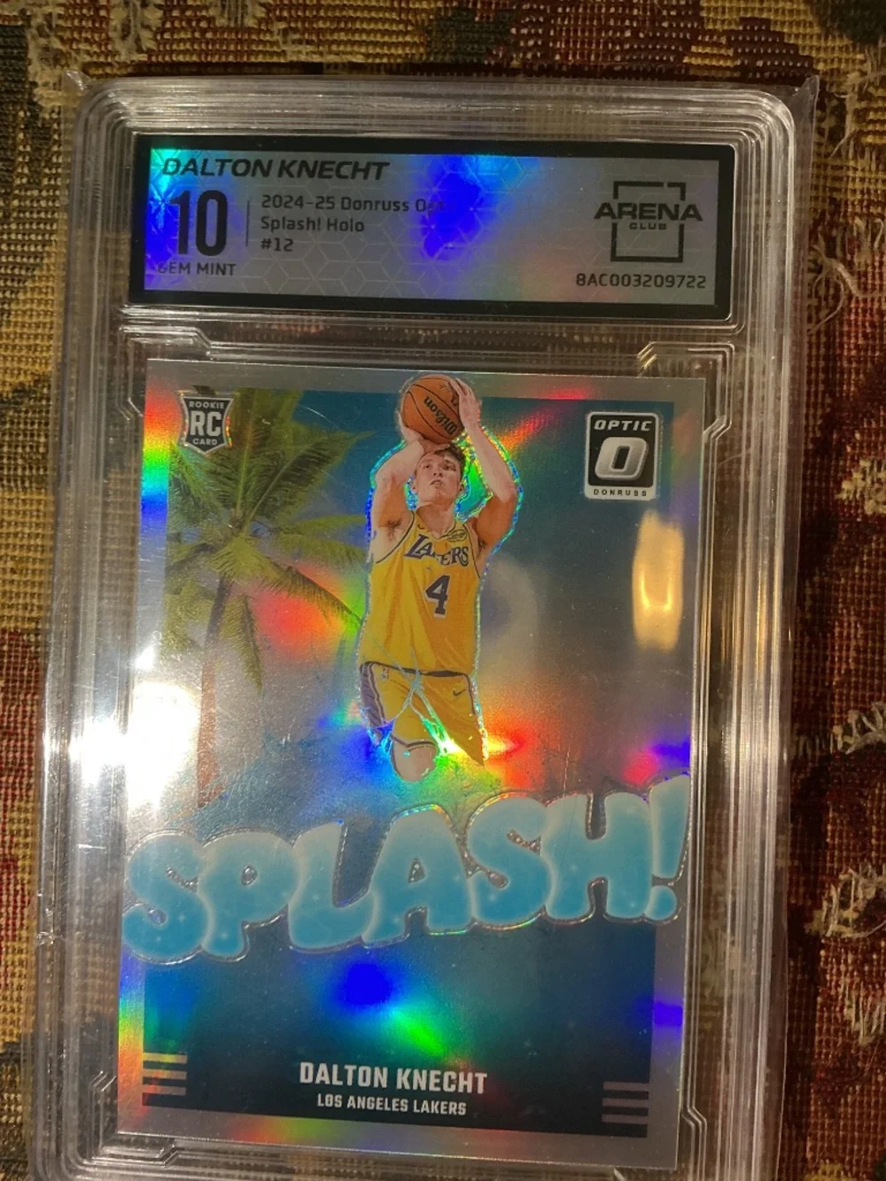 2024-25 Panini Donruss Optic Splash Dalton Knecht #12 Holo rookie grade Arena 10